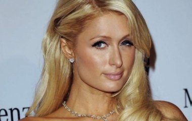 Пэрис Хилтон пришла на вечеринку в наряде хищницы 